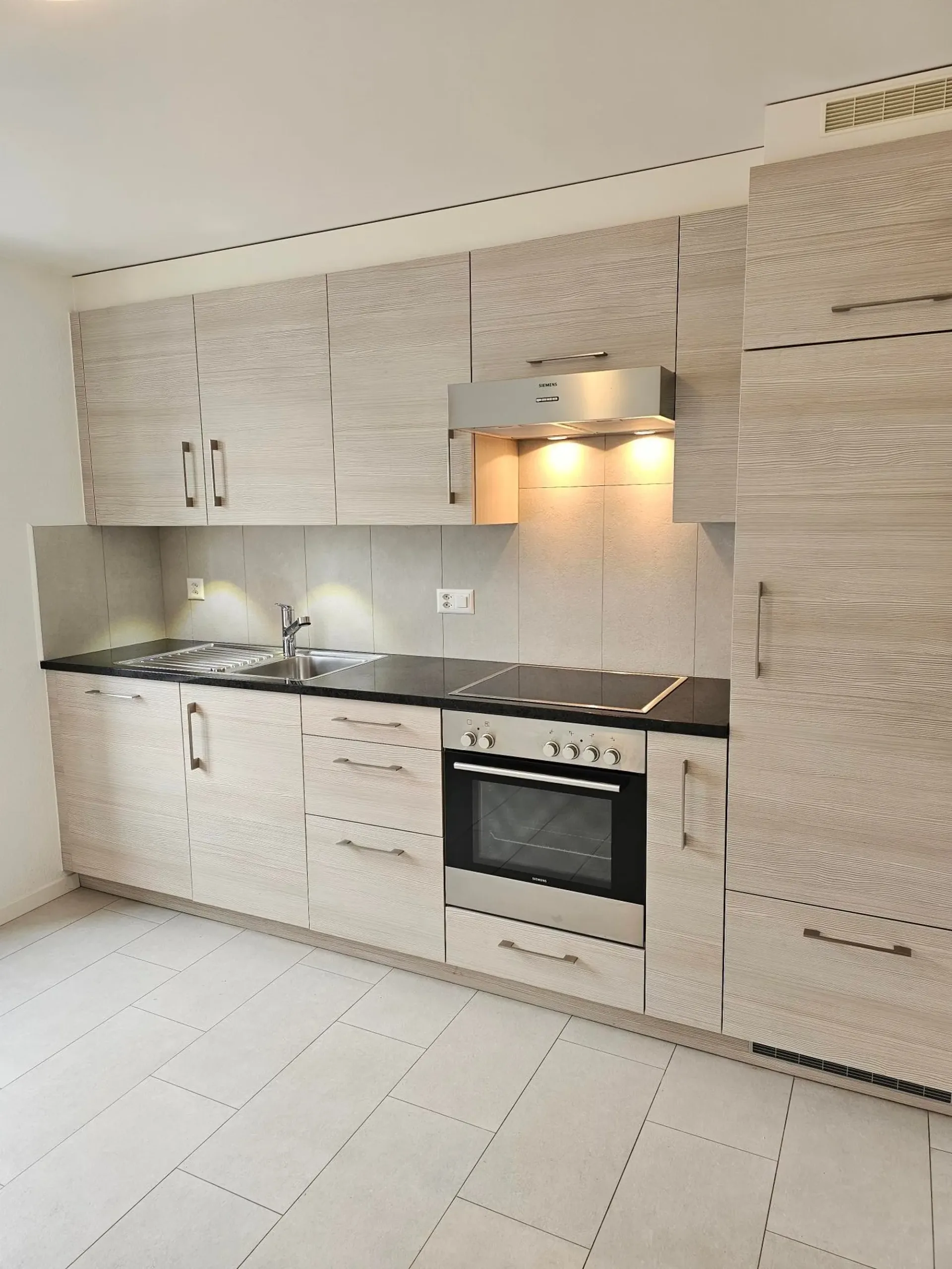 Charmanter 3.5-Zimmer-Wohnung mit Terrasse im Zentrum von Fleurier