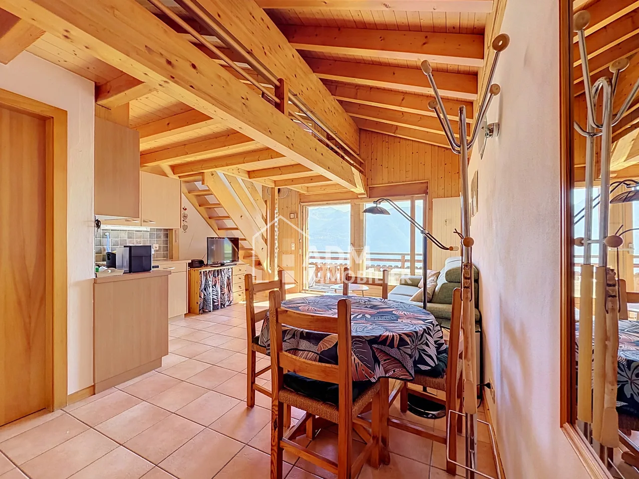Two-room apartment with mezzanine at the foot of the slopes