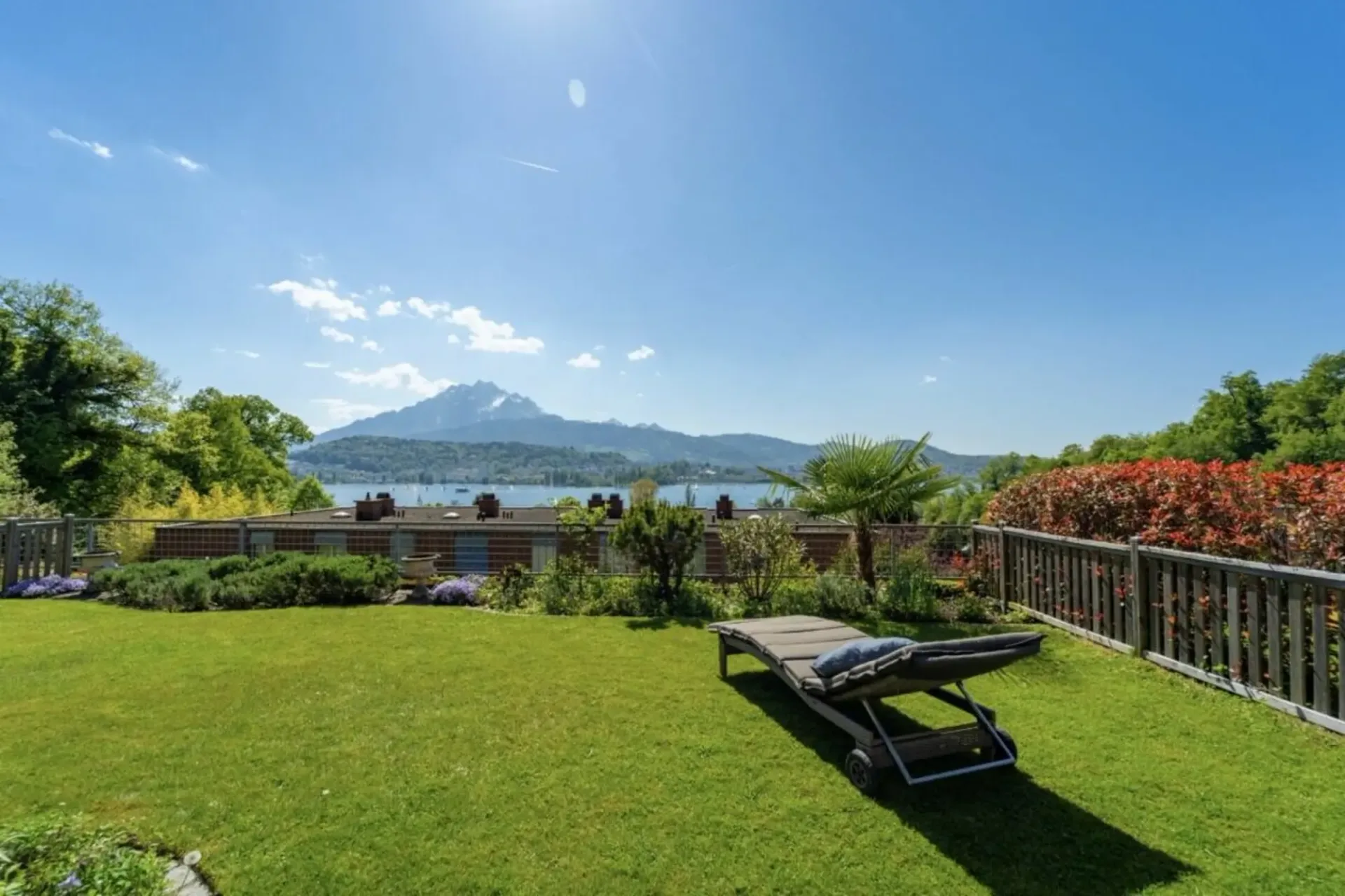 Panoramic spot above Lake Lucerne, elegant row house jewel in Lucerne