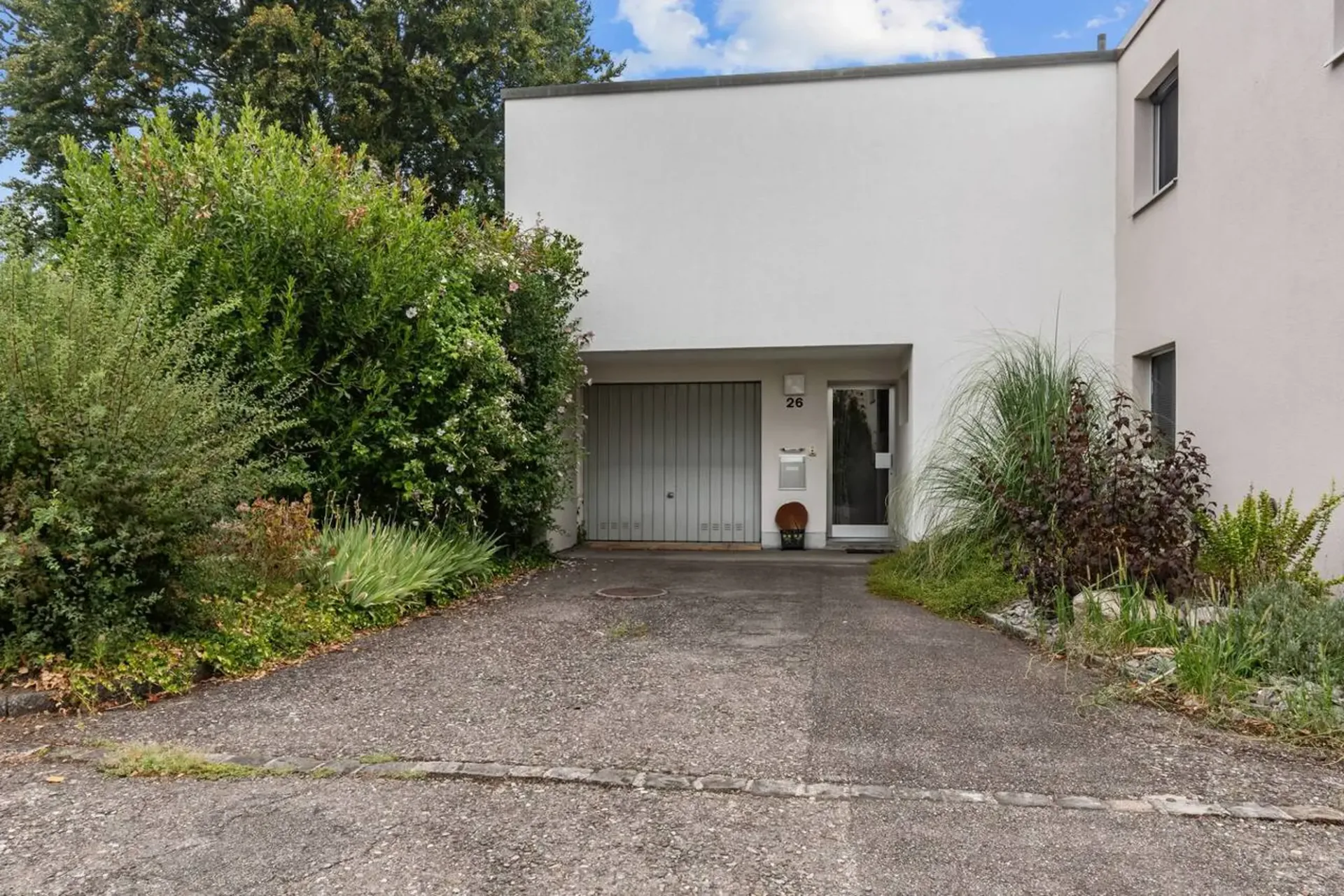 Maison de rang de 5,5 pièces avec beau jardin à Münchenstein!