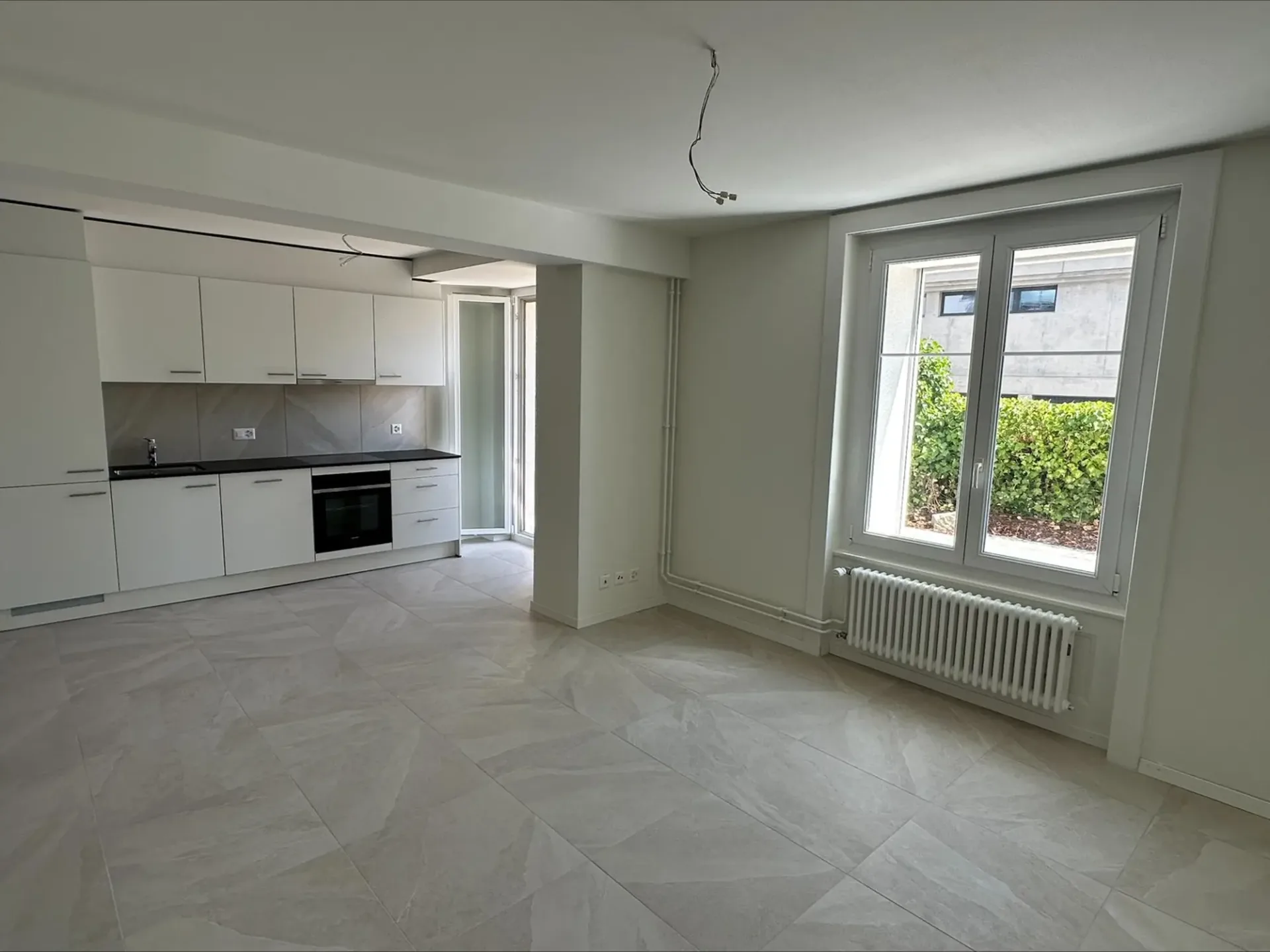 Appartement 3 pièces rénové avec terrasse à Neuchâtel
