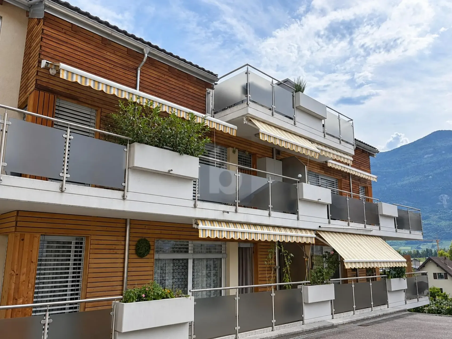 Ein offenes Wohnambiente mit Bergblick