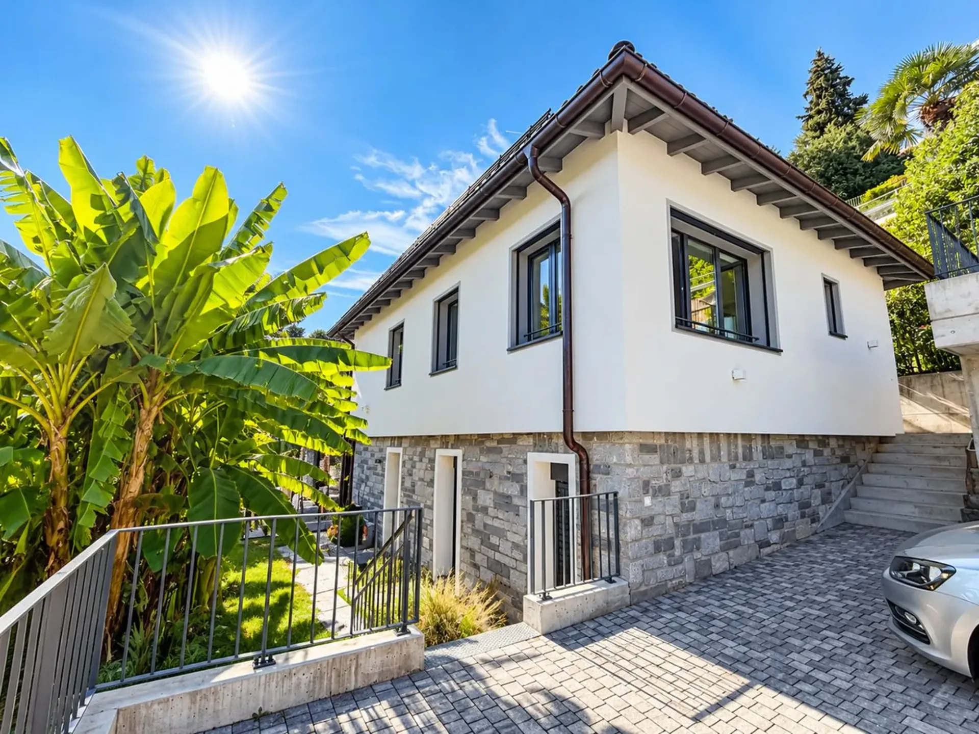 Porza - Elegante appartamento 3.5 locali con vista lago, terrazzo e giardino privato