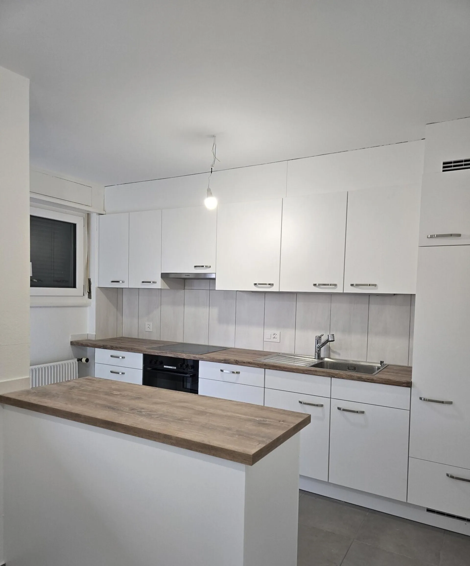 Appartement 4,5 pièces de 88 m2 au 1er étage sans ascenseur